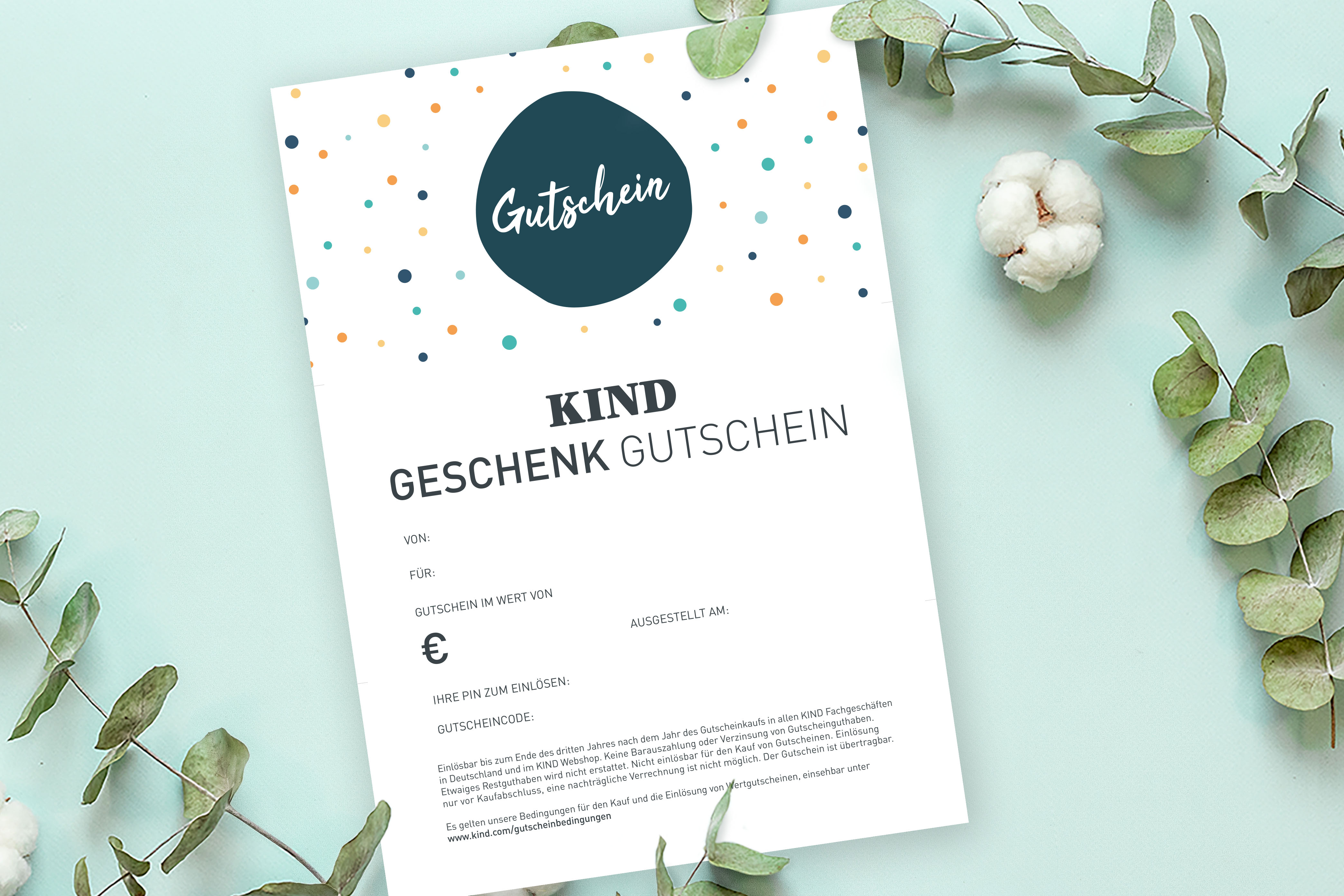 Vollständige Ansicht der Druckversion des Gutschein-Dokuments beim Gutschein-Motiv „Punkte“ auf farbig passendem Hintergrund und Dekorationen.