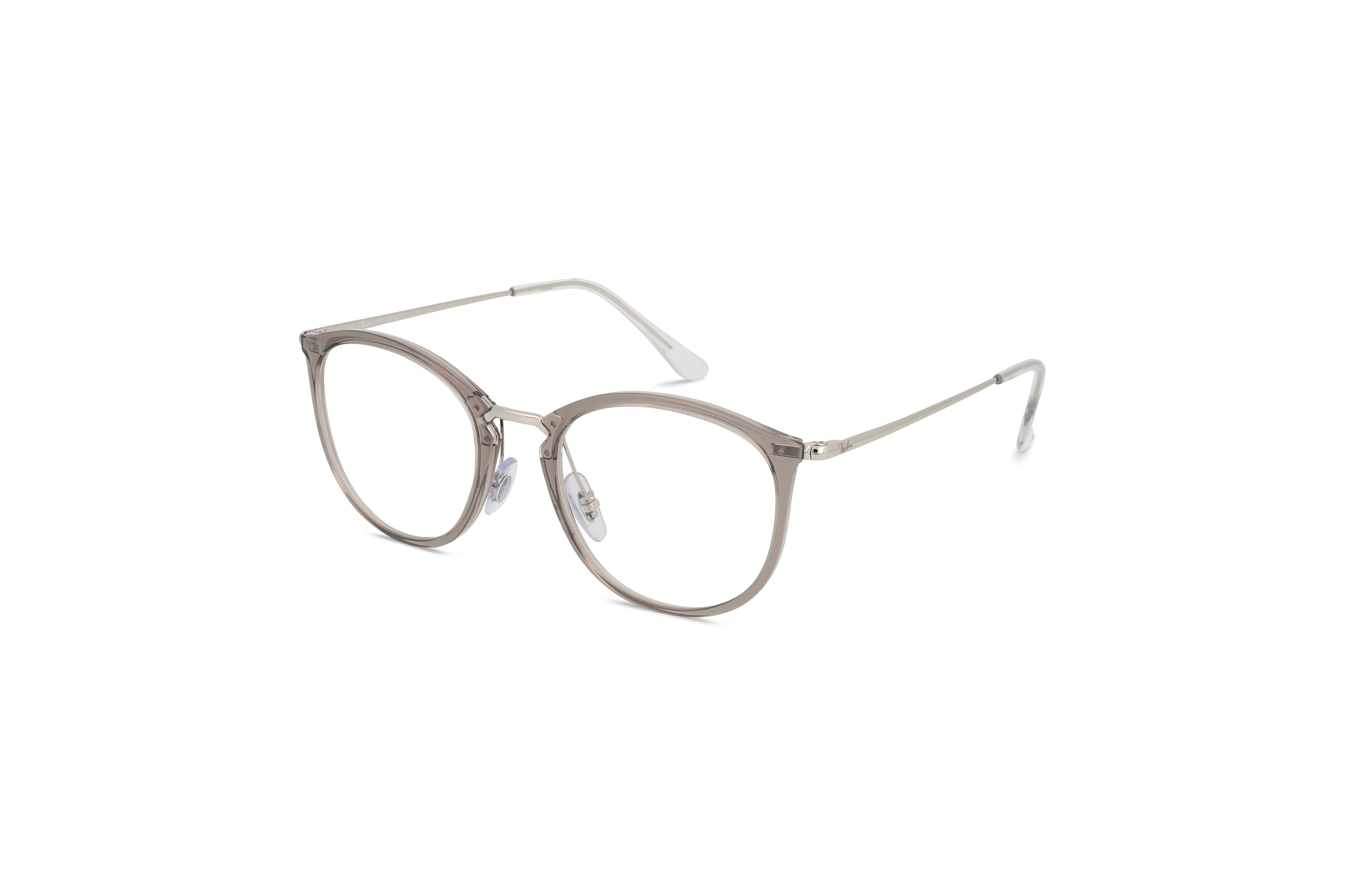 45° Ansicht der Brille Ray-Ban RX7140 in Transparent auf weißem Hintergrund.